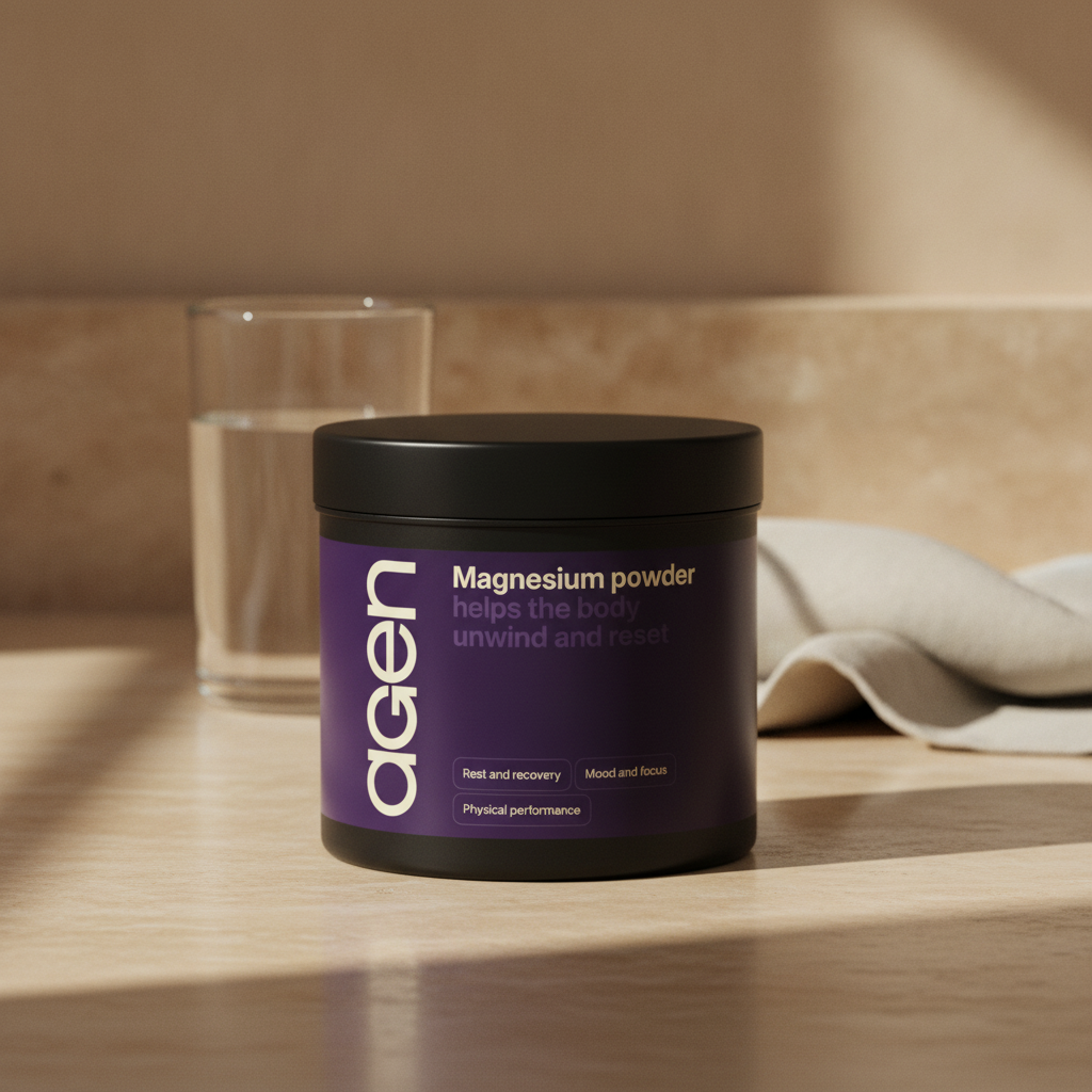 Agen Magnesium Powder tub on a travertine counter in soft morning light