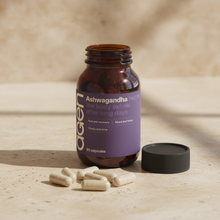 Agen Ashwagandha — open bottle with capsules on a stone counter