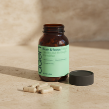 Agen Brain & Focus — open bottle with capsules on a stone counter