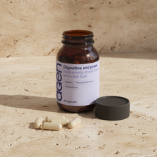 Agen Digestive Enzymes — open bottle with capsules on a stone counter