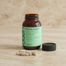 Agen Immune Support — open bottle with capsules on a stone counter