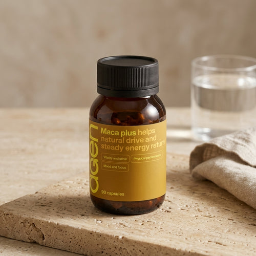Agen Maca Plus bottle on a travertine counter in soft morning light