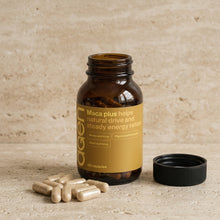 Agen Maca Plus — open bottle with capsules on a stone counter
