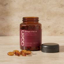 Agen Omega 3 Fish Oil — open jar with softgels on a stone counter