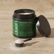 Agen Pre-Workout Mix Powder — open tub with a scoop of powder on a stone counter