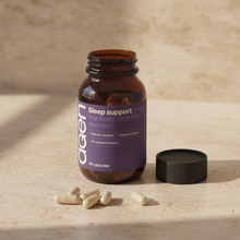 Agen Sleep Support — open bottle with capsules on a stone counter