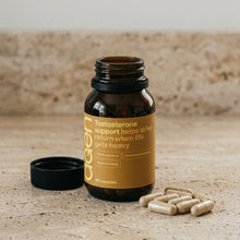 Agen Testosterone Support — open bottle with capsules on a stone counter