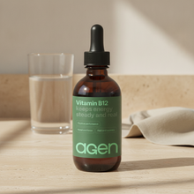 Agen Vitamin B-12 bottle on a travertine counter in soft morning light