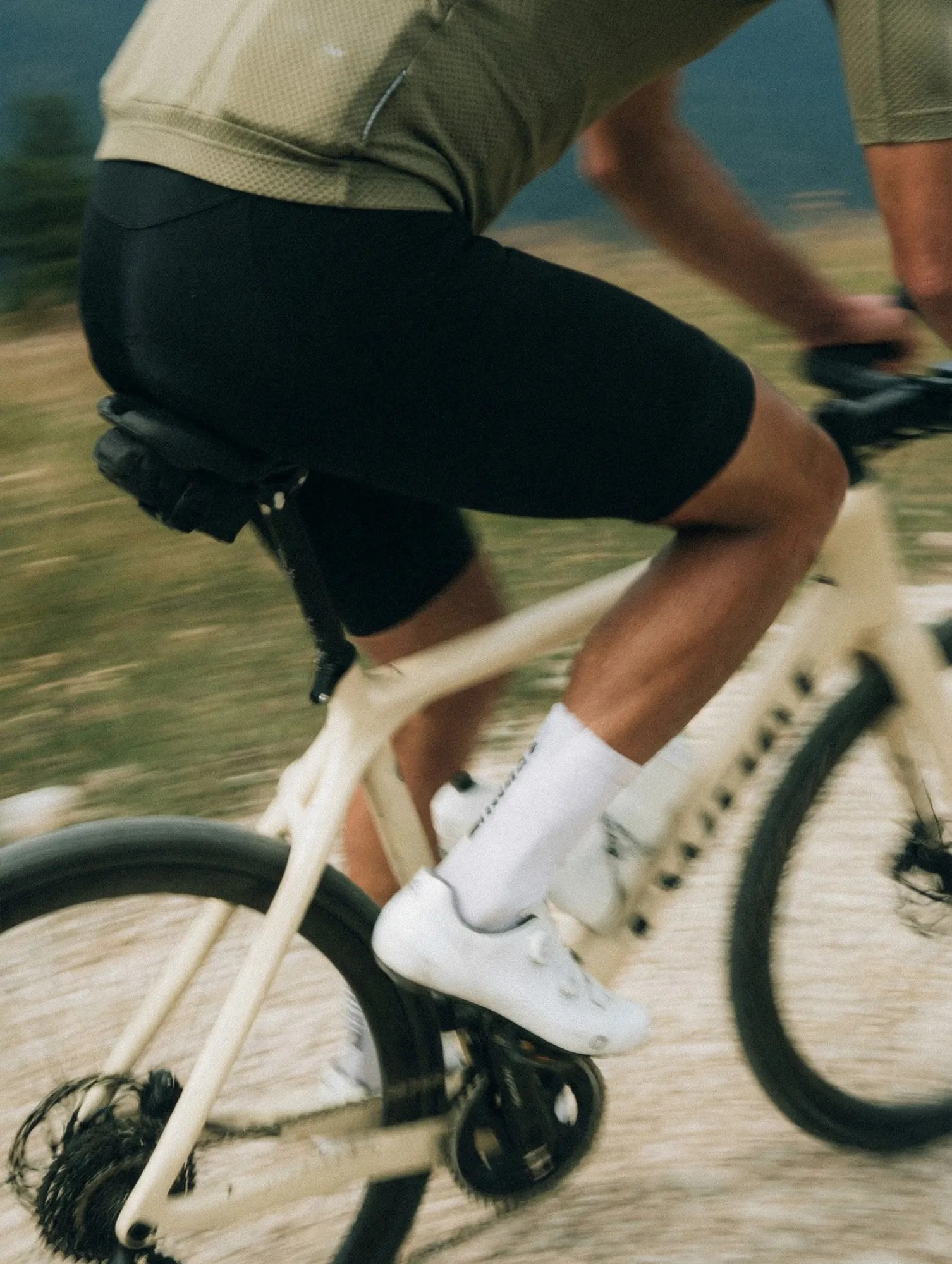 Cyclist in motion on a gravel road